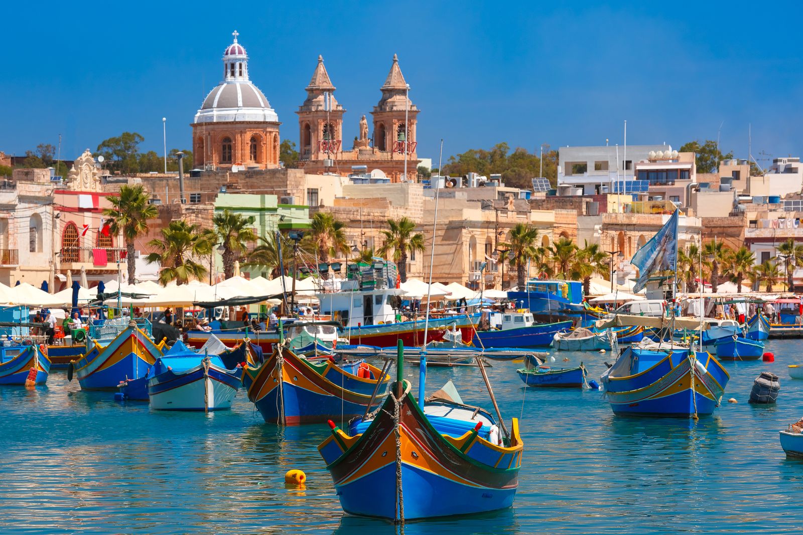Descoperă Fermecătorul Marsaxlokk: O incursiune în cultura și gastronomia Satului Pescăresc Maltez